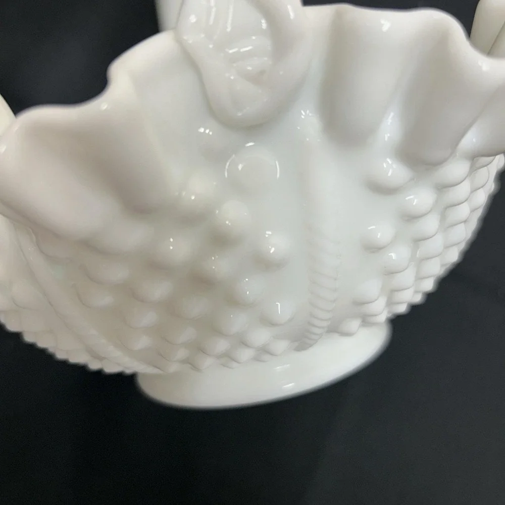 Vintage Fenton Hobnail White Milk Glass Basket with a ruffled edge and handle